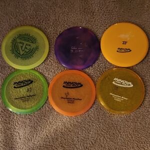 6 Discs Including 2 Putt And Approach 2 Mid - Range And 2 Distance Drivers.